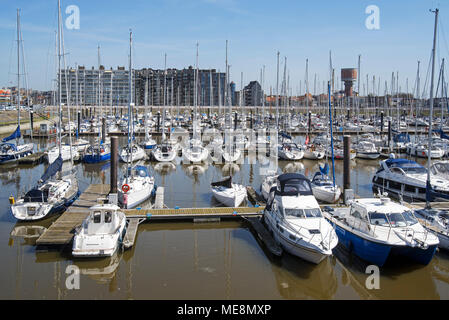 Sailing boats, motorboats and pleasure yachts in the marina at seaside resort Blankenberge along the North Sea coast, West Flanders, Belgium Stock Photo