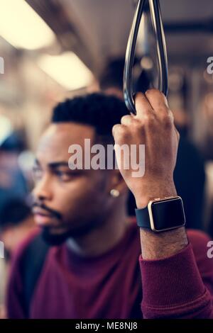 African man on a train Stock Photo