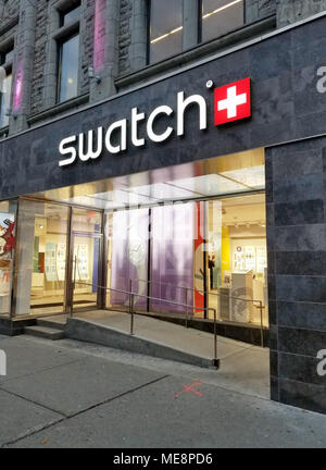MONTREAL, CANADA - MARCH 10, 2018: Swatch store and logo in Montreal. Swatch is a Swiss watchmaker founded in 1983 by Nicolas Hayek and a subsidiary o Stock Photo