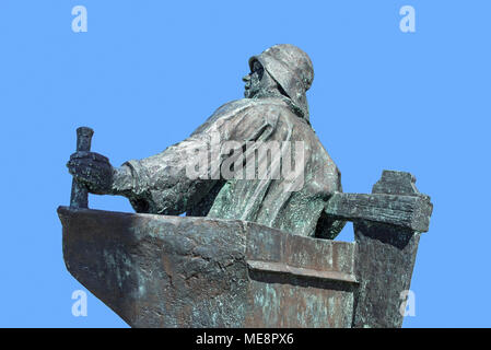 Statue De Stuurman / Sterken Dries showing fisherman at the helm at seaside resort Blankenberge along the North Sea coast, West Flanders, Belgium Stock Photo