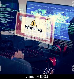 Computer with warning pop up sign window Stock Photo
