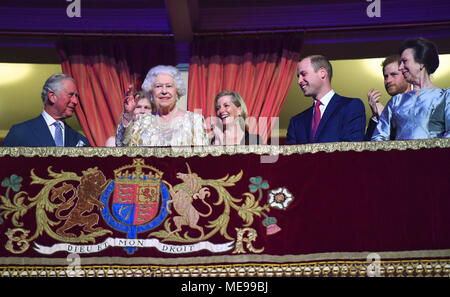 Queen Elizabeth II, surrounded by members of the royal family, takes her seat at the Royal Albert Hall in London to attend a star-studded concert to celebrate her 92nd birthday. Stock Photo