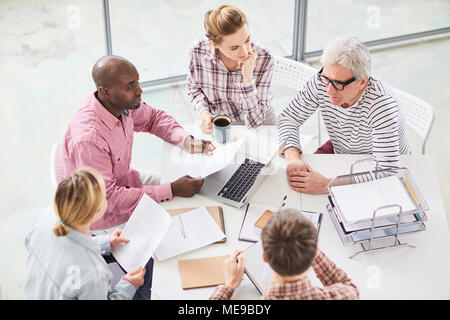 High angle view of business team planning work at the table Stock Photo