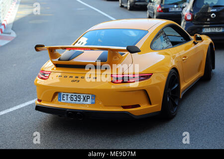 Monte-Carlo, Monaco - April 21, 2018: Luxury Yellow Porsche 911 GT3 (Rear View) In The Street Of Monaco On The French Riviera Stock Photo