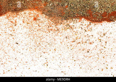 Different spices and herbs scattered on white background top view. Texture and template Stock Photo