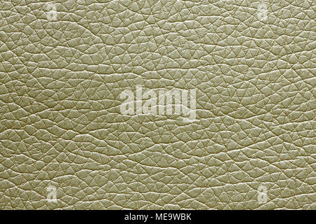 Wonderful leatherette background in light olive hue. Stock Photo