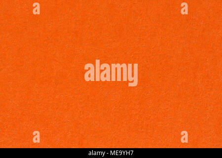 Orange colored paper texture background. Stock Photo