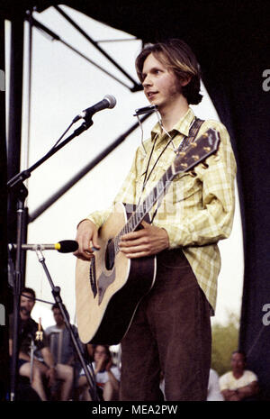 Recording artist Beck, with acoustic guitar, on stage at the Lollapalooza music festival in Tinley Park, Illinois, in 1995. Stock Photo