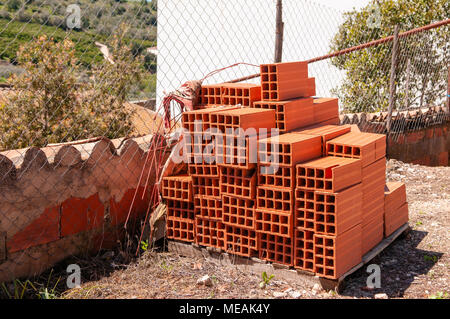 Red terracotta building bricks, typically used in Portugal. Stock Photo