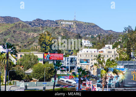 LOS ANGELES - MAR 26, 2018: View of the Hollywood Sign in Los Angeles as seen from downtown Hollywood Boulevard. Synonymous with the Hollywood film in Stock Photo