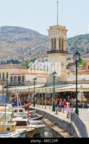 Boats and yachts in front of the Clock Tower - Hydra, Saronic Islands, Greece Stock Photo