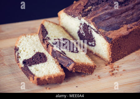 Marble Cake with chocolate filling. Home made. Stock Photo