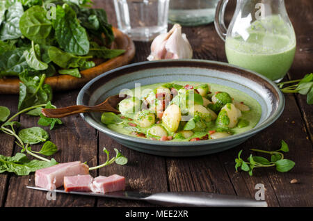 Gnocchi with bacon and basil spinach sauce, delish food photography, food advertisment Stock Photo