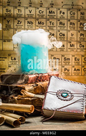 Dynamic blue chemical reaction in school laboratory Stock Photo