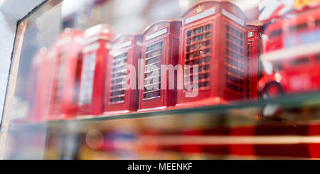 A London souvenir shop displaying British souvenirs including classic British red telephone boxes in the UK Stock Photo