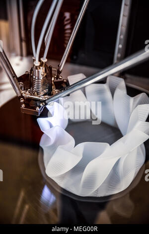3D printer printing, also known as additive manufacturing (AM), refers to processes used to create a three-dimensional object in which layers of mater Stock Photo