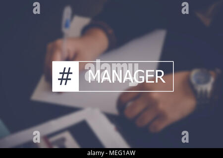 Manager word with business blurring background Stock Photo