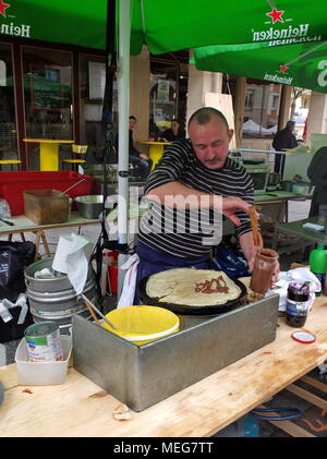 Crepe making at a busy stall in Fontenay Aux roses, just outside Paris. Stock Photo