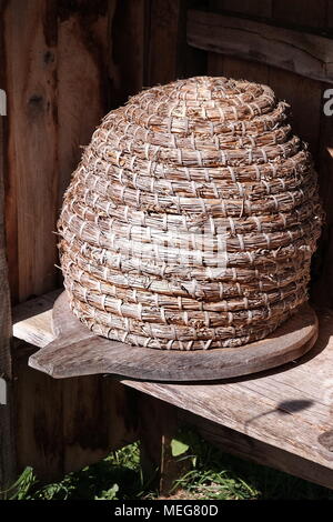 One of the two skeps (beehives) shown at the Weald and downland museum, Chichester. Stock Photo