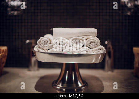 Restroom in hotel or restaurant, focus on towels white Stock Photo