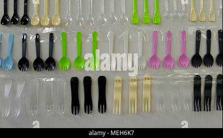 Different shapes and styles of plastic cutlery, forks, spoons and sporks at the China International Bakery Exhibition and trade fair in Beijing, China Stock Photo