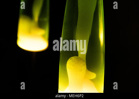 Lava lamp reflection. Abstract isolated composition on black background Stock Photo