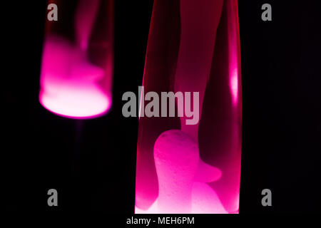 Lava lamp reflection. Abstract isolated composition on black background Stock Photo
