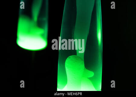 Lava lamp reflection. Abstract isolated composition on black background Stock Photo