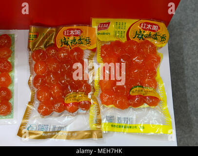 Vacuum packed thousand year old eggs on show at the China International Bakery exhibition and trade fair in Beijing, China Stock Photo