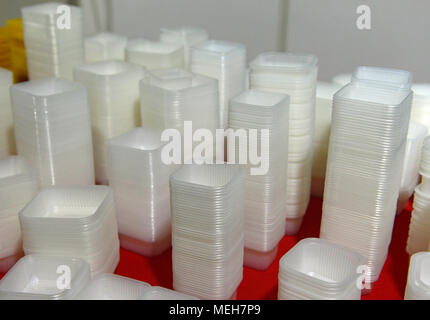 Plastic food containers on display at the China International Bakery Products Exhibition and trade fair in Beijing, China Stock Photo
