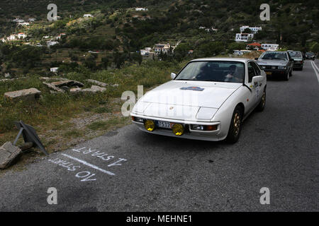 Andros, Greece. 21st Apr, 2018. Vintage cars take part in the 24th Spring Classic Car Rally organized by Philpa (Greek Federation of Old Cars) in Andros island, Greece, on April 21, 2018. Credit: Marios Lolos/Xinhua/Alamy Live News Stock Photo