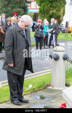 Andrew Seddon, Poppy Appeal Organiser and Branch Secretary of the Penketh and Sankey Branch of The Royal British Legion bows his head after laying a wreath in Commemoration of the anniversary of ANZAC day - Warrington, UK, 22 April 2018. The Anniversary of ANZAC Day has been commemorated on Sunday 22 April 2018 within Soldiers' Corner of Warrington Cemetery when the Deputy Mayor, Cllr Karen Mundry, Cadets from the Queen's Lancashire Regiment, Warrington Sea Cadets and many veterans were in attendance Credit: John Hopkins/Alamy Live News