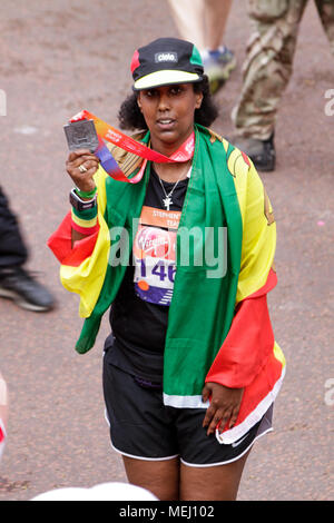 London, UK. 22nd April 2018. Selam Amare, one of the ten runners to cross the finish line raising money for the Stephen Lawrence Charitable Trust during Sunday’s Virgin Money London Marathon, 25 years to the day since the teenager was murdered in a racially motivated attack. The race Credit: Elsie Kibue / Alamy Live News Stock Photo