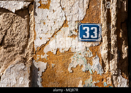 Old brick weathered wall, background, Arnea, Greece architecture Stock Photo