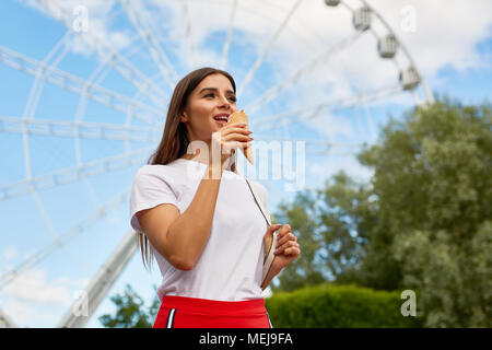 Girl eating icecream Stock Photo
