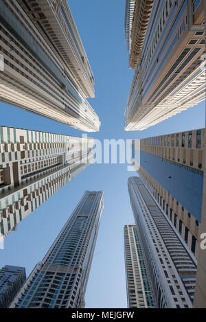 Skyscrapers in Dubai make pedestrians feel very small when viewed from below Stock Photo