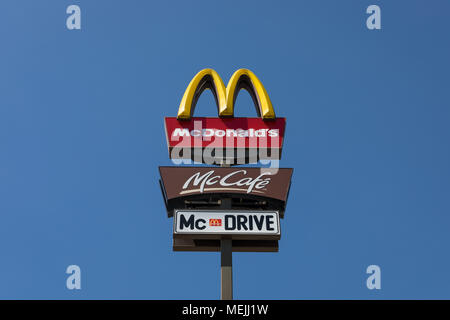 McDonald's Mc Drive brand logo sign, signage detail closeup, cloudy sky ...