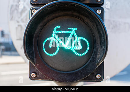 glowing traffic light in green for bicycles Stock Photo
