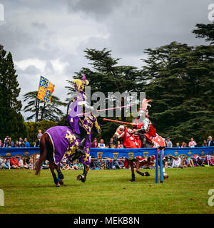 Two knights come together as they joust in a tournament Stock Photo
