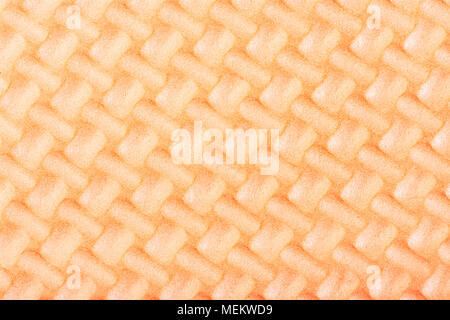 Peach colored textured ethylene vinyl acetate closeup. Stock Photo