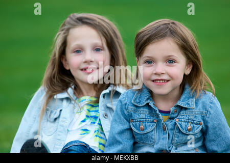 Close up portrait of two little sisters. Stock Photo