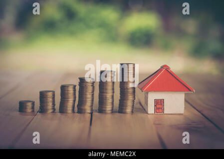 Money Saving Ideas for Homes, Financial and Financial Ideas, Saving Money in Preparing for the Future, Growing Up of Coins Stock Photo