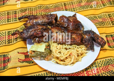 Guinea pig dish. Peruvian delicacy commonly served in restaurants in the mountains. Latin name of the dish is cuy chactado. Stock Photo