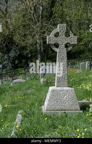 BRAMBER, WEST SUSSEX/UK - APRIL 20 : Stone Cross in St Nicholas Church Cemetery in Bramber West Sussex UK on April 20, 2018 Stock Photo