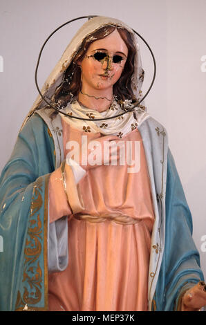 Virgin Mary with eyes gouged out, devastated on 13 January 1992 by Serbia and Montenegro invaders, saint Nicholas church in Cilipi, Croatia Stock Photo