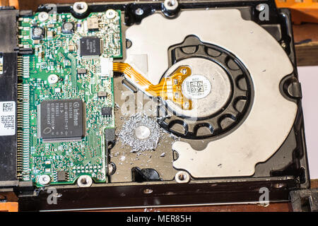 Concept picture, a distressed PC hard drive. Stock Photo