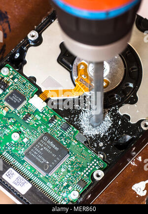 Concept picture, a distressed PC hard drive. Stock Photo