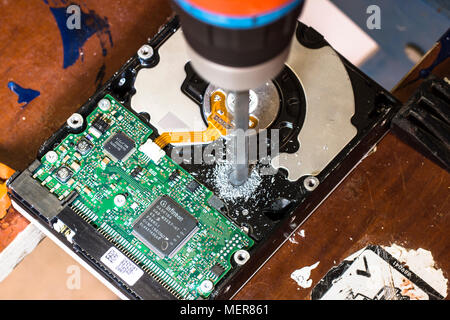 Concept picture, a distressed PC hard drive. Stock Photo