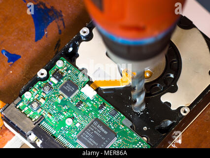Concept picture, a distressed PC hard drive. Stock Photo