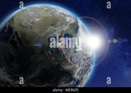 Planet Earth viewed from space. Sun shining through the atmosphere. Starry background. Focus on USA. Composition with world image from NASA Stock Photo